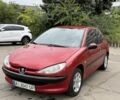 Красный Пежо 206, объемом двигателя 1.4 л и пробегом 203 тыс. км за 3500 $, фото 1 на Automoto.ua