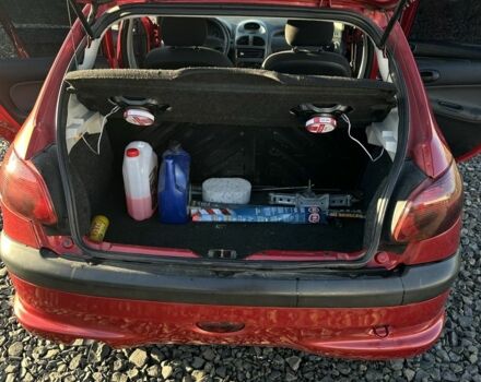 Красный Пежо 206, объемом двигателя 1.4 л и пробегом 165 тыс. км за 2850 $, фото 4 на Automoto.ua