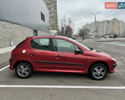Красный Пежо 206, объемом двигателя 1.4 л и пробегом 76 тыс. км за 5200 $, фото 1 на Automoto.ua