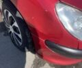 Красный Пежо 206, объемом двигателя 1.4 л и пробегом 200 тыс. км за 3600 $, фото 1 на Automoto.ua