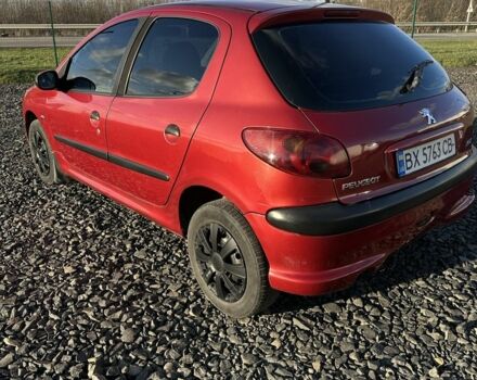 Красный Пежо 206, объемом двигателя 1.4 л и пробегом 165 тыс. км за 2850 $, фото 5 на Automoto.ua