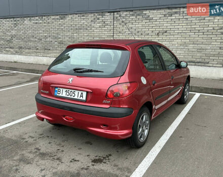 Красный Пежо 206, объемом двигателя 1.4 л и пробегом 76 тыс. км за 5200 $, фото 2 на Automoto.ua