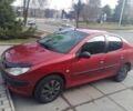 Червоний Пежо 206, об'ємом двигуна 1.4 л та пробігом 213 тис. км за 3000 $, фото 2 на Automoto.ua
