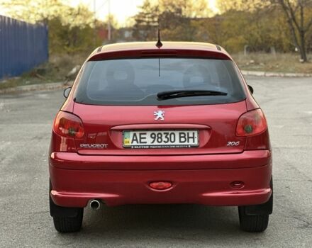 Красный Пежо 206, объемом двигателя 1.4 л и пробегом 119 тыс. км за 4500 $, фото 2 на Automoto.ua