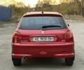 Красный Пежо 206, объемом двигателя 1.4 л и пробегом 119 тыс. км за 4500 $, фото 2 на Automoto.ua