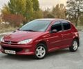 Красный Пежо 206, объемом двигателя 1.4 л и пробегом 119 тыс. км за 4500 $, фото 1 на Automoto.ua