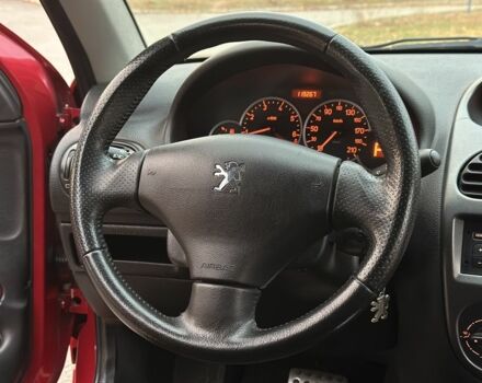 Красный Пежо 206, объемом двигателя 1.4 л и пробегом 119 тыс. км за 4500 $, фото 13 на Automoto.ua