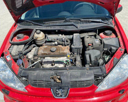 Красный Пежо 206, объемом двигателя 1.4 л и пробегом 130 тыс. км за 2600 $, фото 2 на Automoto.ua