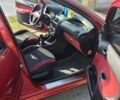 Красный Пежо 206, объемом двигателя 1.36 л и пробегом 146 тыс. км за 4000 $, фото 11 на Automoto.ua
