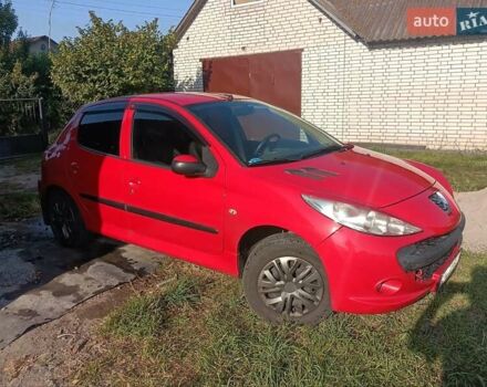 Красный Пежо 206, объемом двигателя 1.4 л и пробегом 232 тыс. км за 4000 $, фото 6 на Automoto.ua