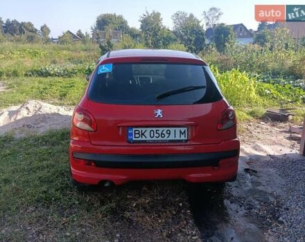 Красный Пежо 206, объемом двигателя 1.4 л и пробегом 232 тыс. км за 4000 $, фото 2 на Automoto.ua