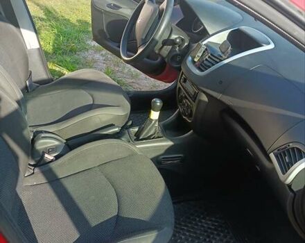 Красный Пежо 206, объемом двигателя 1.4 л и пробегом 232 тыс. км за 4000 $, фото 3 на Automoto.ua