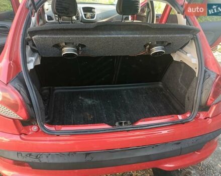 Красный Пежо 206, объемом двигателя 1.4 л и пробегом 232 тыс. км за 4000 $, фото 10 на Automoto.ua