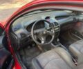 Красный Пежо 206, объемом двигателя 1.2 л и пробегом 250 тыс. км за 1599 $, фото 4 на Automoto.ua