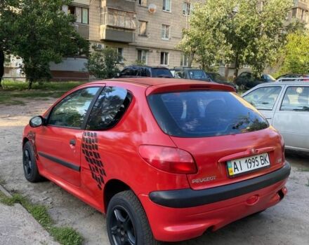 Красный Пежо 206, объемом двигателя 1.2 л и пробегом 250 тыс. км за 1599 $, фото 3 на Automoto.ua