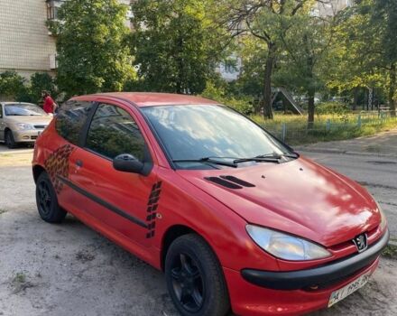 Красный Пежо 206, объемом двигателя 1.2 л и пробегом 250 тыс. км за 1599 $, фото 1 на Automoto.ua