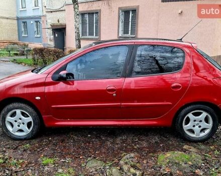 Красный Пежо 206, объемом двигателя 1.36 л и пробегом 226 тыс. км за 3799 $, фото 12 на Automoto.ua