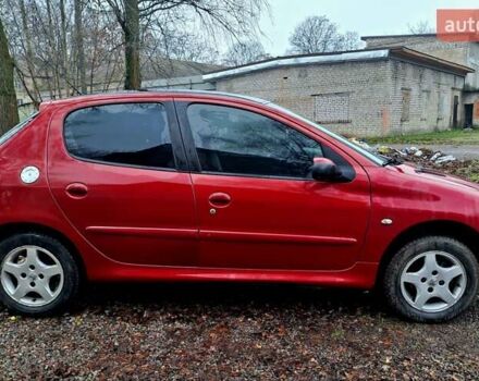 Красный Пежо 206, объемом двигателя 1.36 л и пробегом 226 тыс. км за 3799 $, фото 7 на Automoto.ua