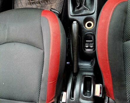 Красный Пежо 206, объемом двигателя 1.36 л и пробегом 226 тыс. км за 3799 $, фото 26 на Automoto.ua