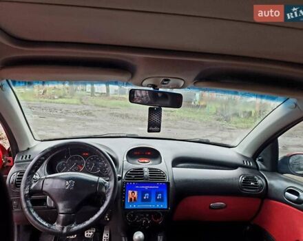 Красный Пежо 206, объемом двигателя 1.36 л и пробегом 226 тыс. км за 3799 $, фото 20 на Automoto.ua