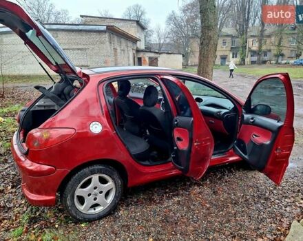 Красный Пежо 206, объемом двигателя 1.36 л и пробегом 226 тыс. км за 3799 $, фото 45 на Automoto.ua