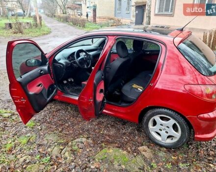 Красный Пежо 206, объемом двигателя 1.36 л и пробегом 226 тыс. км за 3799 $, фото 25 на Automoto.ua