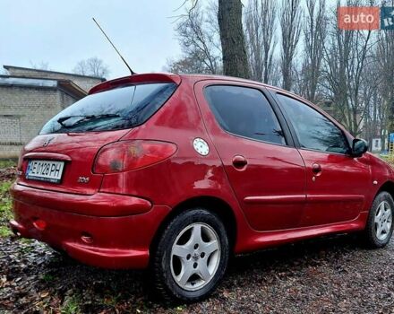 Красный Пежо 206, объемом двигателя 1.36 л и пробегом 226 тыс. км за 3799 $, фото 10 на Automoto.ua