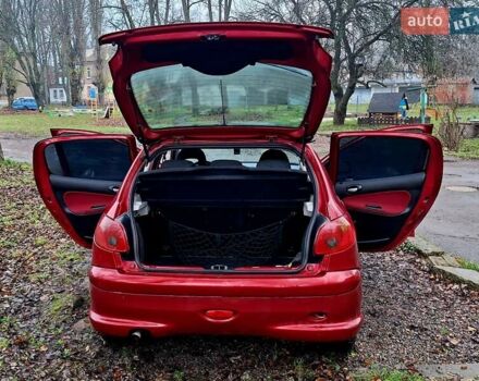 Красный Пежо 206, объемом двигателя 1.36 л и пробегом 226 тыс. км за 3799 $, фото 46 на Automoto.ua