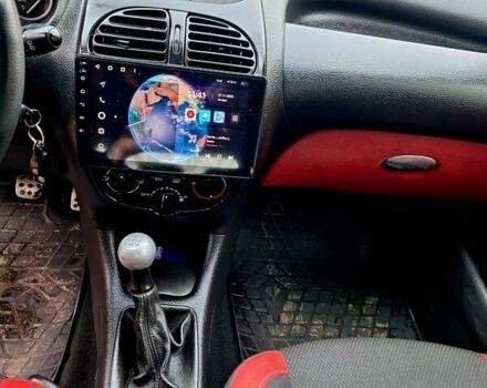 Красный Пежо 206, объемом двигателя 1.36 л и пробегом 226 тыс. км за 3799 $, фото 32 на Automoto.ua