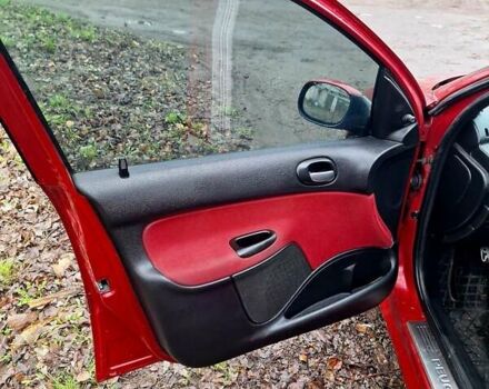 Красный Пежо 206, объемом двигателя 1.36 л и пробегом 226 тыс. км за 3799 $, фото 15 на Automoto.ua