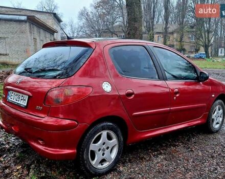 Красный Пежо 206, объемом двигателя 1.36 л и пробегом 226 тыс. км за 3799 $, фото 9 на Automoto.ua