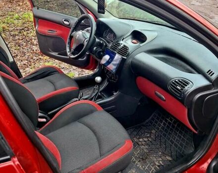 Красный Пежо 206, объемом двигателя 1.36 л и пробегом 226 тыс. км за 3799 $, фото 29 на Automoto.ua