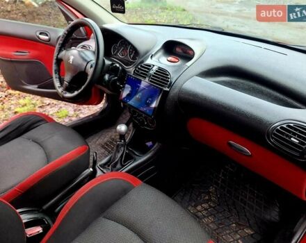 Красный Пежо 206, объемом двигателя 1.36 л и пробегом 226 тыс. км за 3799 $, фото 30 на Automoto.ua