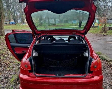 Красный Пежо 206, объемом двигателя 1.36 л и пробегом 226 тыс. км за 3799 $, фото 44 на Automoto.ua