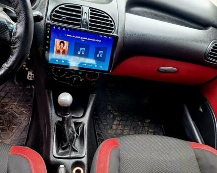 Красный Пежо 206, объемом двигателя 1.36 л и пробегом 226 тыс. км за 3799 $, фото 19 на Automoto.ua