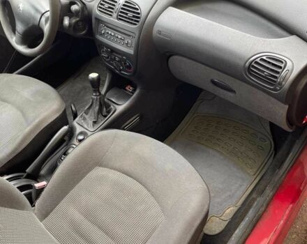Красный Пежо 206, объемом двигателя 1.4 л и пробегом 170 тыс. км за 2800 $, фото 3 на Automoto.ua