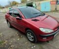 Червоний Пежо 206, об'ємом двигуна 1.36 л та пробігом 230 тис. км за 3800 $, фото 7 на Automoto.ua