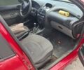 Красный Пежо 206, объемом двигателя 1.36 л и пробегом 194 тыс. км за 1450 $, фото 2 на Automoto.ua