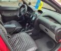 Червоний Пежо 206, об'ємом двигуна 1.36 л та пробігом 230 тис. км за 3800 $, фото 11 на Automoto.ua