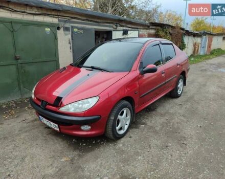 Червоний Пежо 206, об'ємом двигуна 1.36 л та пробігом 230 тис. км за 3800 $, фото 6 на Automoto.ua