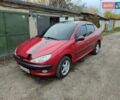 Червоний Пежо 206, об'ємом двигуна 1.36 л та пробігом 230 тис. км за 3800 $, фото 6 на Automoto.ua