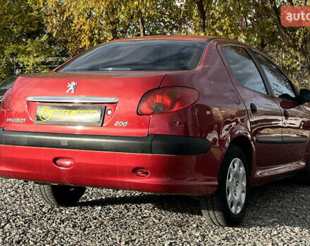 Червоний Пежо 206, об'ємом двигуна 1.4 л та пробігом 139 тис. км за 3999 $, фото 5 на Automoto.ua