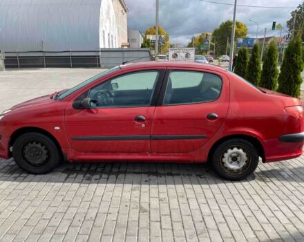 Красный Пежо 206, объемом двигателя 1.4 л и пробегом 170 тыс. км за 2800 $, фото 1 на Automoto.ua