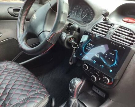 Червоний Пежо 206, об'ємом двигуна 1.36 л та пробігом 230 тис. км за 3800 $, фото 12 на Automoto.ua