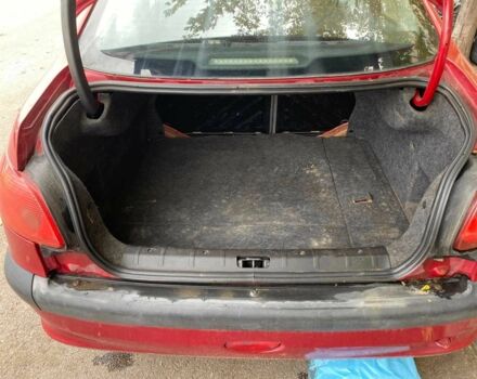 Красный Пежо 206, объемом двигателя 1.4 л и пробегом 170 тыс. км за 2800 $, фото 5 на Automoto.ua