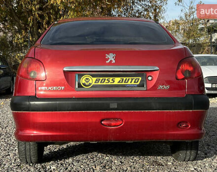 Красный Пежо 206, объемом двигателя 1.4 л и пробегом 139 тыс. км за 3999 $, фото 4 на Automoto.ua