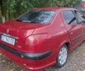 Красный Пежо 206, объемом двигателя 1.36 л и пробегом 194 тыс. км за 1350 $, фото 1 на Automoto.ua