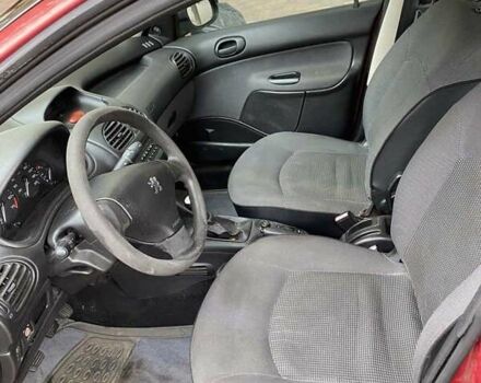 Червоний Пежо 206, об'ємом двигуна 1.4 л та пробігом 170 тис. км за 2800 $, фото 8 на Automoto.ua
