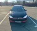 Червоний Пежо 206, об'ємом двигуна 1.36 л та пробігом 177 тис. км за 3200 $, фото 1 на Automoto.ua