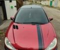 Червоний Пежо 206, об'ємом двигуна 1.36 л та пробігом 230 тис. км за 3800 $, фото 1 на Automoto.ua